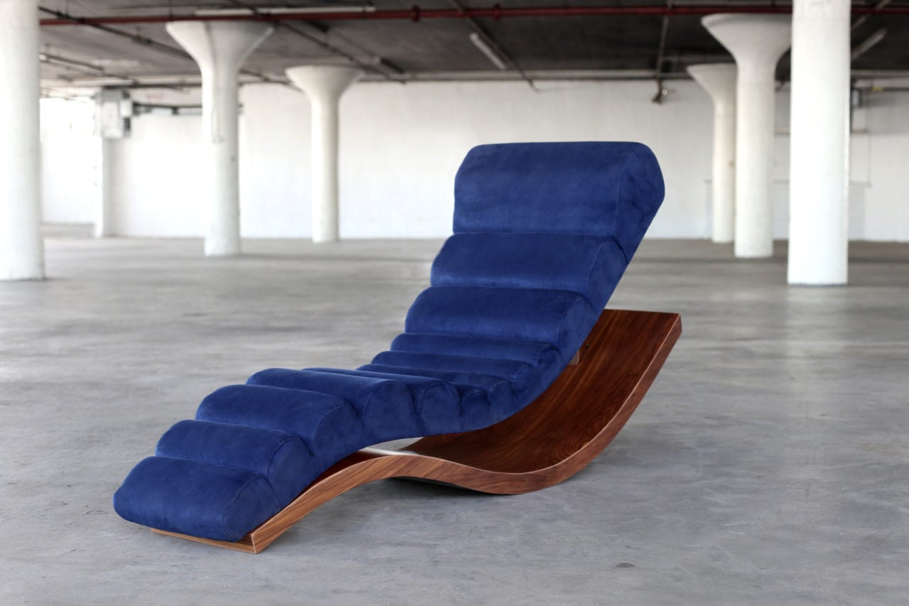 Luxury lounge chairs - wave lounge chair in luxury blue velvet with custom walnut base  by SENTIENT