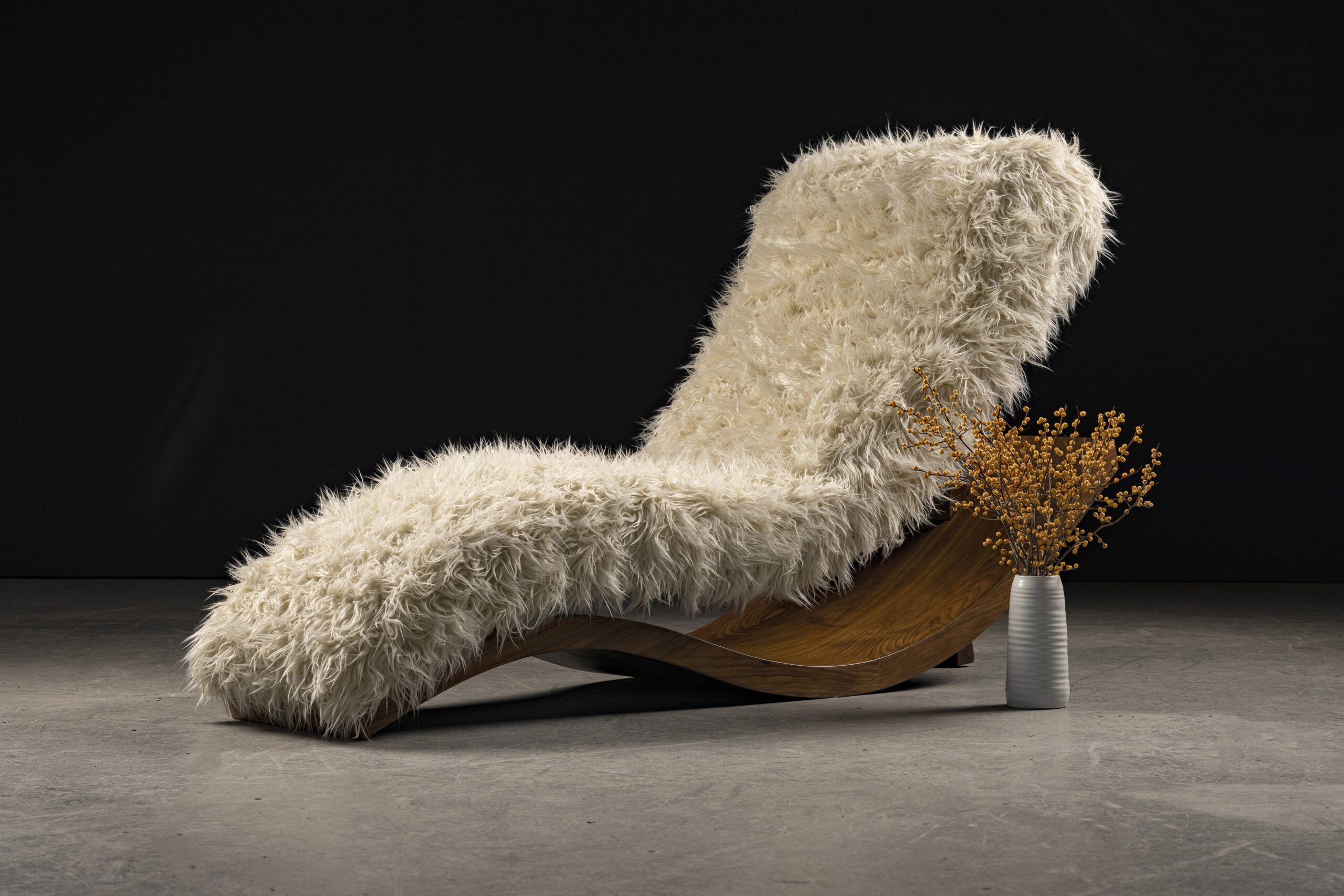 Luxury chaise lounge, the Wave, by SENTIENT furniture, in white fur and dark wooden base